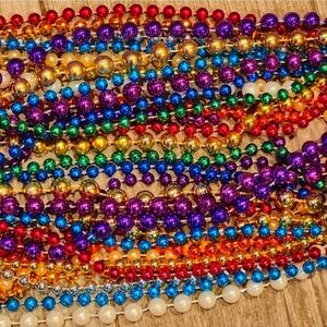 17 ASSORTED MARDI GRAS BEADS